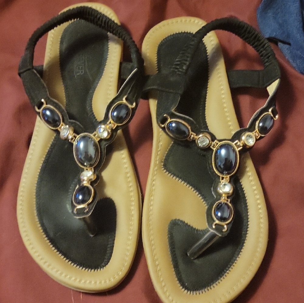 Stylish Black and Tan Sandals with Blue Embellishments